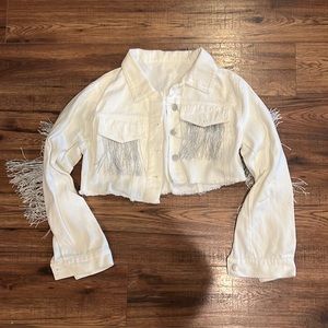 Cropped white jean jacket with silver fringe